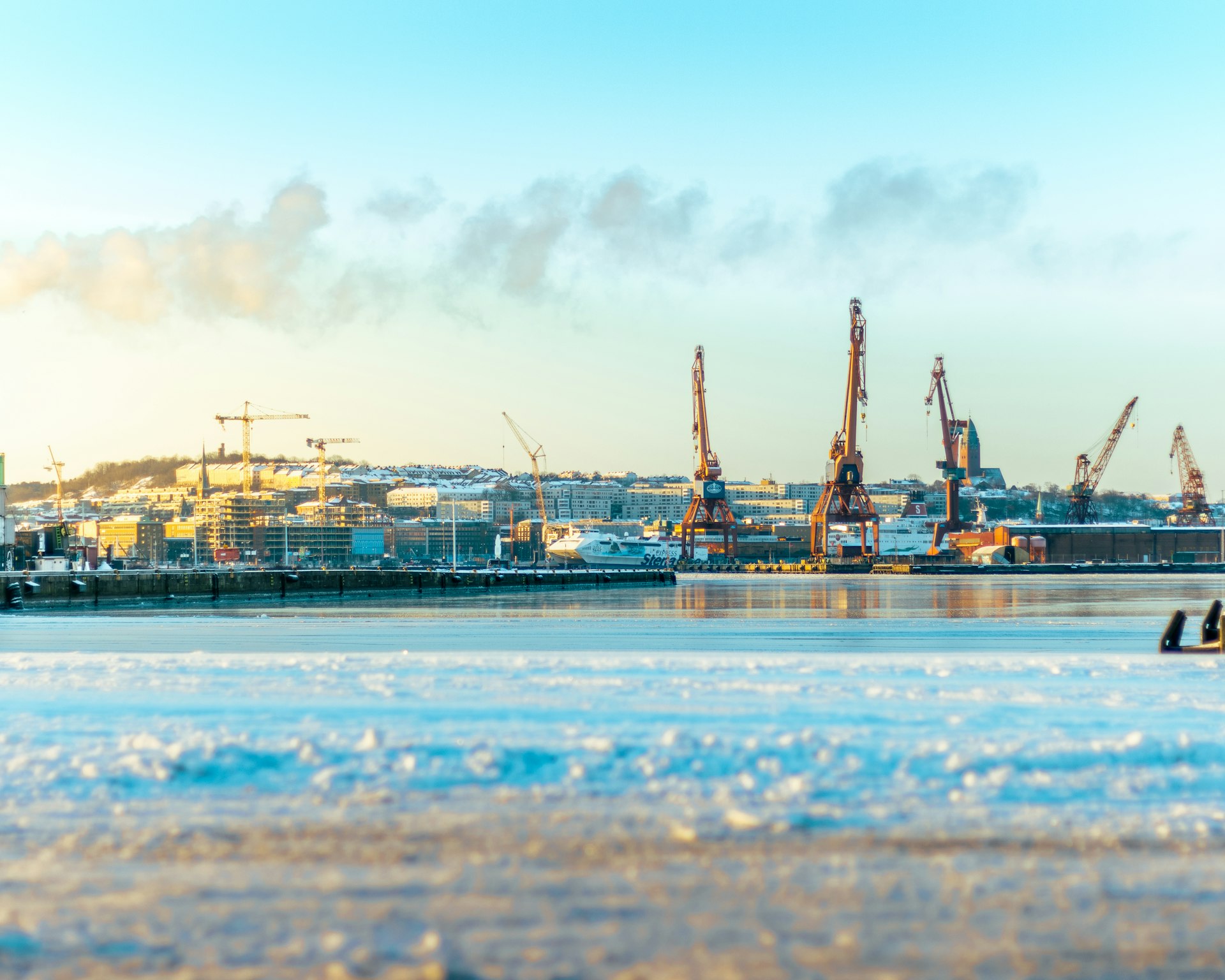blue and white ship on sea during daytime